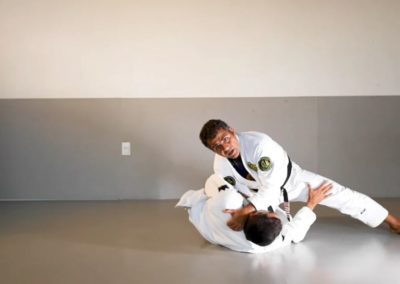 Knee Slice and Choke Attack From Half Guard