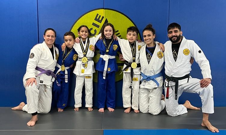 Gracie Competition KidsTeam showing their medals after a weekend tournament.